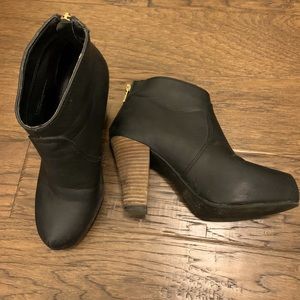 Black leather high heel booties